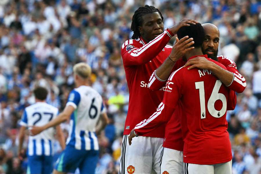 Bryan Mbeumo celebrates with teammates after scoring Man Utd's second goal at the Amex Bryan Mbeumo celebrates with teammates after scoring Man Utd's second goal at the Amex