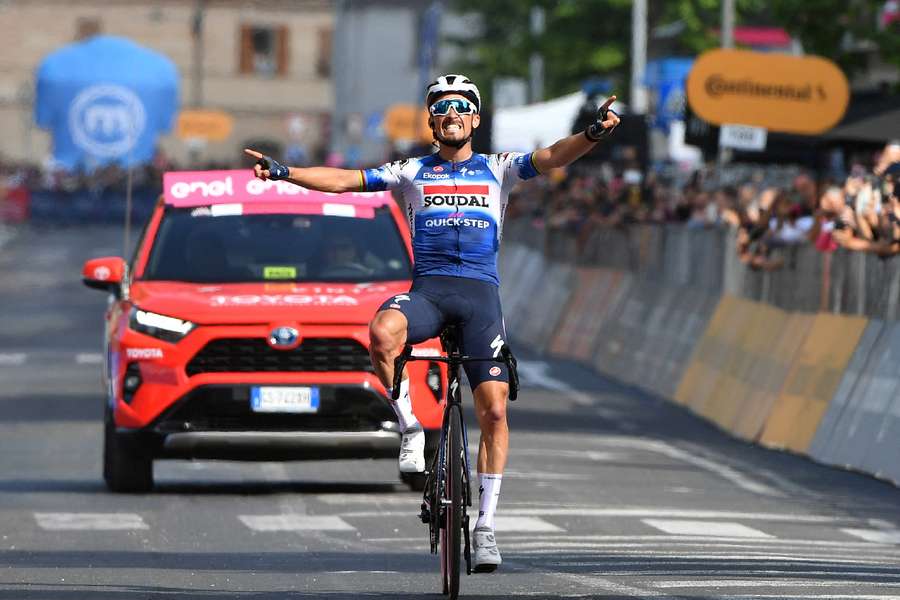 Alaphilippe crossing the line for victory