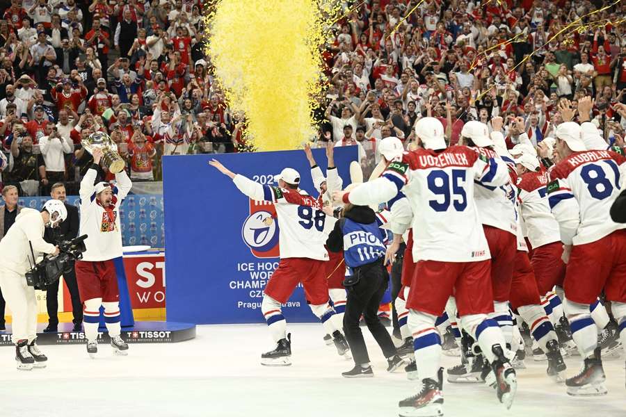 The Czech players celebrate their win in the final