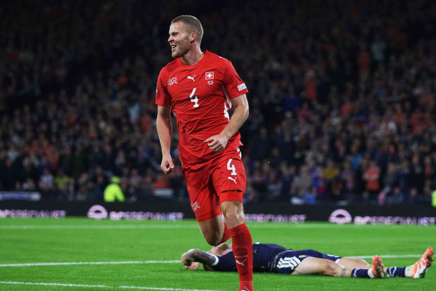 Nico Elvedi celebrates after scoring Switzerland's second goal
