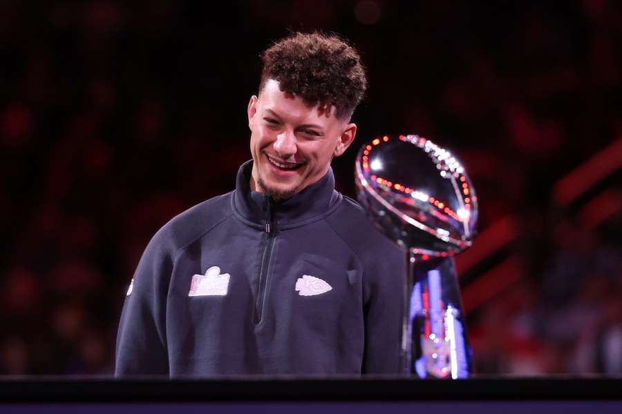 Mahomes smiles during the Super Bowl LVIII opening night ceremony