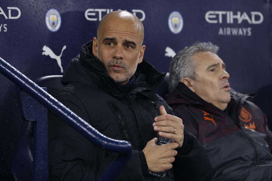 Guardiola watches on from the bench
