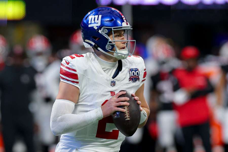 New York Giants quarterback Drew Lock stepping back for a pass against the Atlanta Falcons