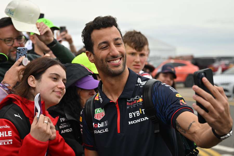 Red Bull Racing's Australian reserve driver Daniel Ricciardo arrives for the Formula 1 British Grand Prix at the Silverstone motor racing circuit
