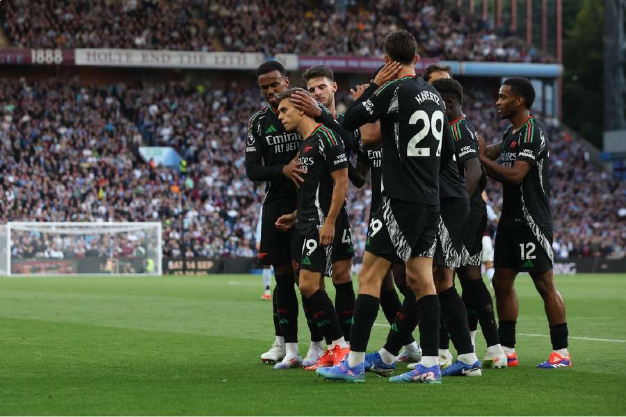 Arsenal celebrate Trossard's goal