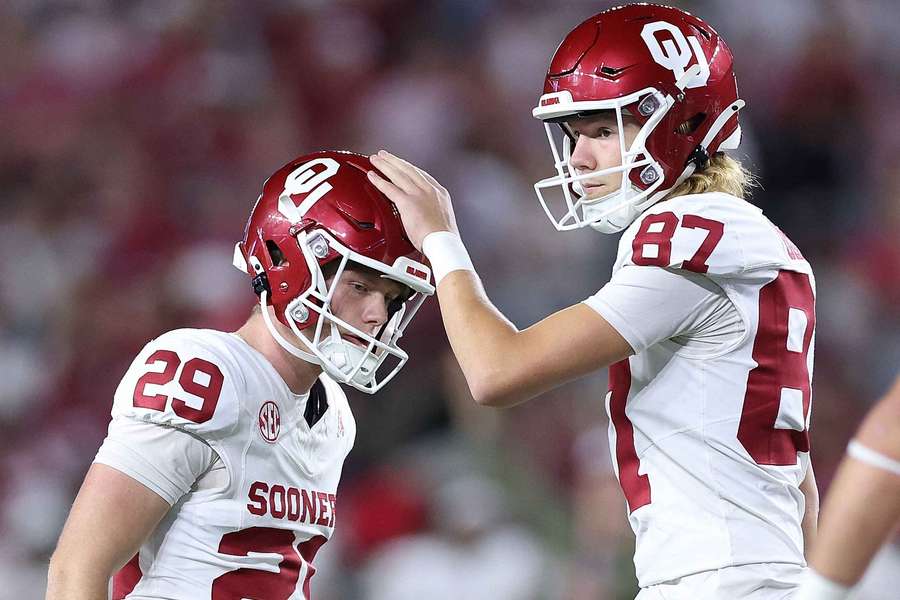 Tate Sandell (left) reacts after kicking a go-ahead field goal against Alabama (2025) Tate Sandell (left) reacts after kicking a go-ahead field goal against Alabama (2025)