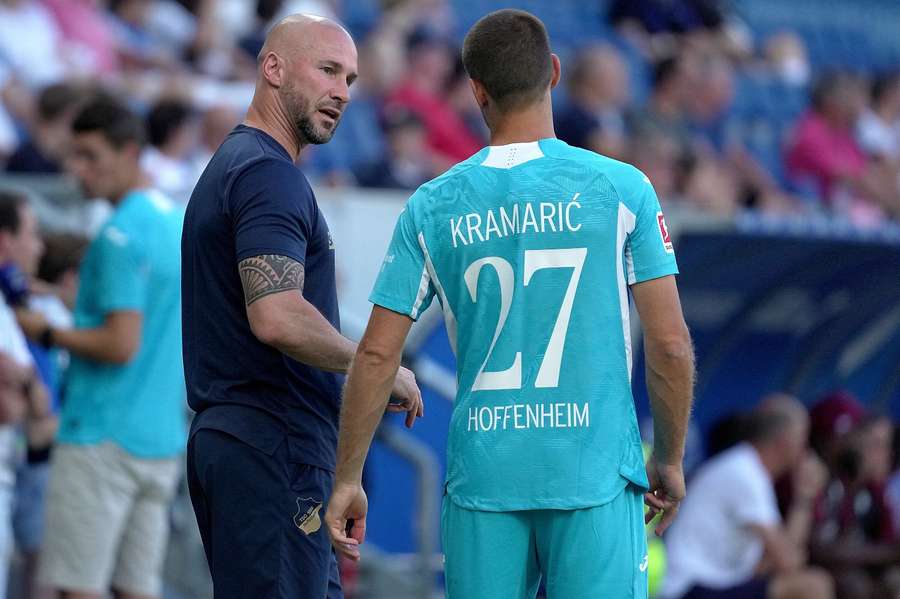 Hoffenheim Trainer Christian Ilzer (l.) und Andrej Kramaric (r.)