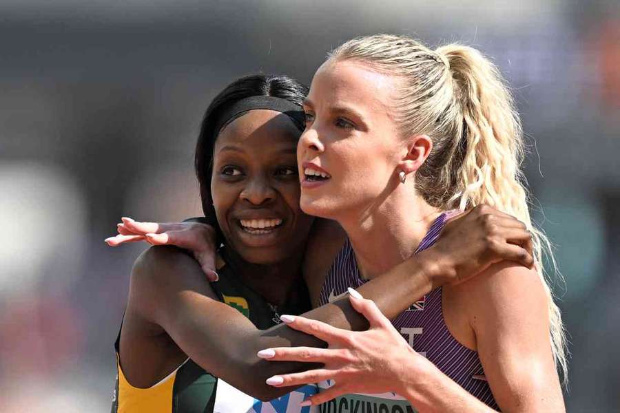 South Africa's Prudence Sekgodiso hugs Keely Hodgkinson after the women's 800m heats