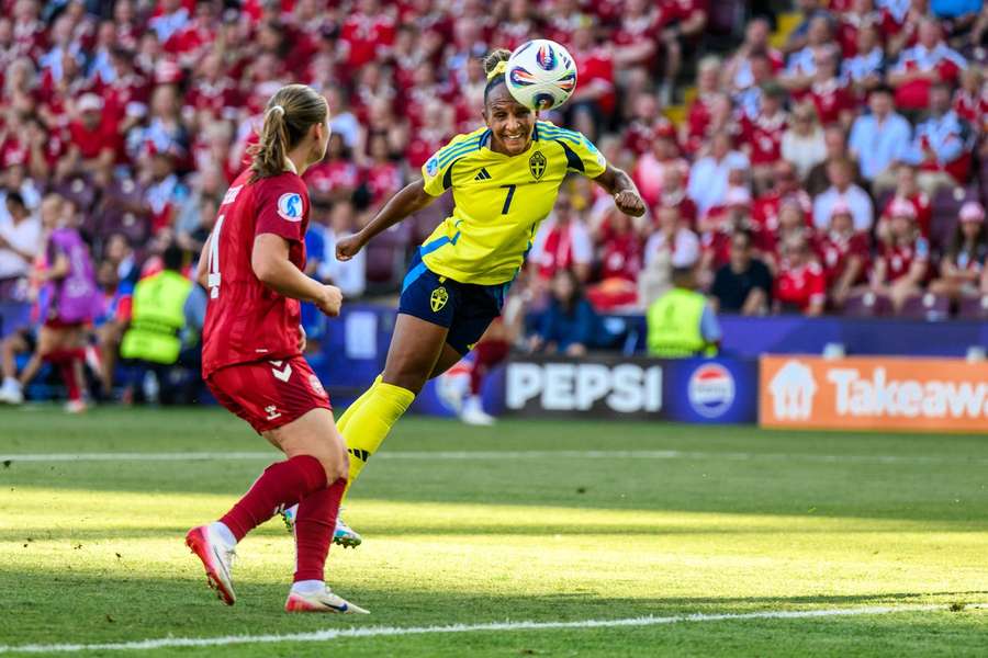 Sweden's Madelen Janogy attempts a header during the game against Denmark