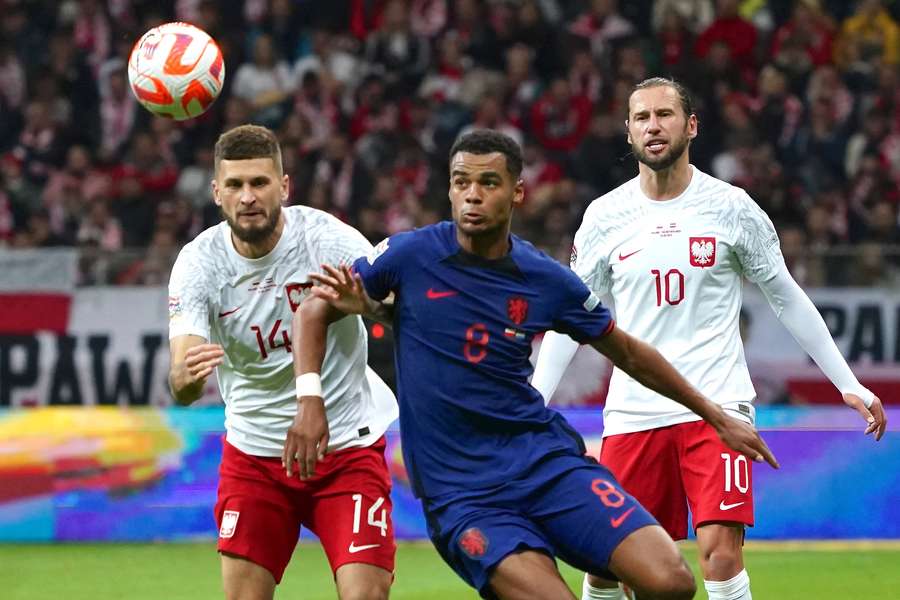 Forward Cody Gakpo goes for the ball during the UEFA Nations League Group match between Poland and The Netherlands 