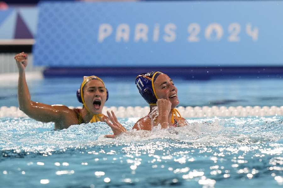 Spain celebrate scoring against Australia