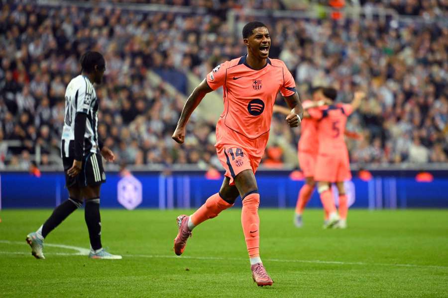 Marcus Rashford celebrates after giving Barcelona the lead at Newcastle