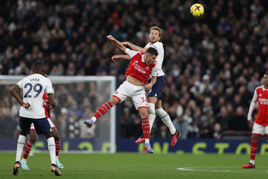 Tottenham Hotspur's English striker Harry Kane vies with Arsenal's midfielder Granit Xhaka