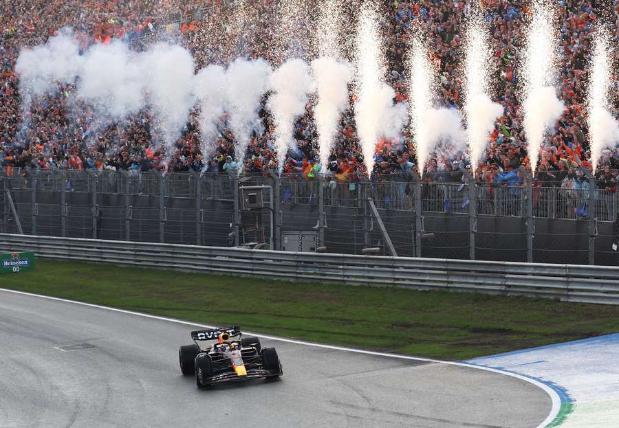 Max Verstappen crosses the line to win the Dutch GP