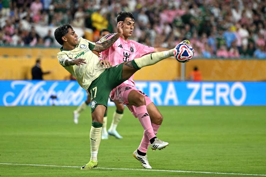 Palmeiras forward Facundo Torres (left) fights for the ball against Inter Miami's Tadeo Allende (right) during the 2025 FIFA Club World Cup