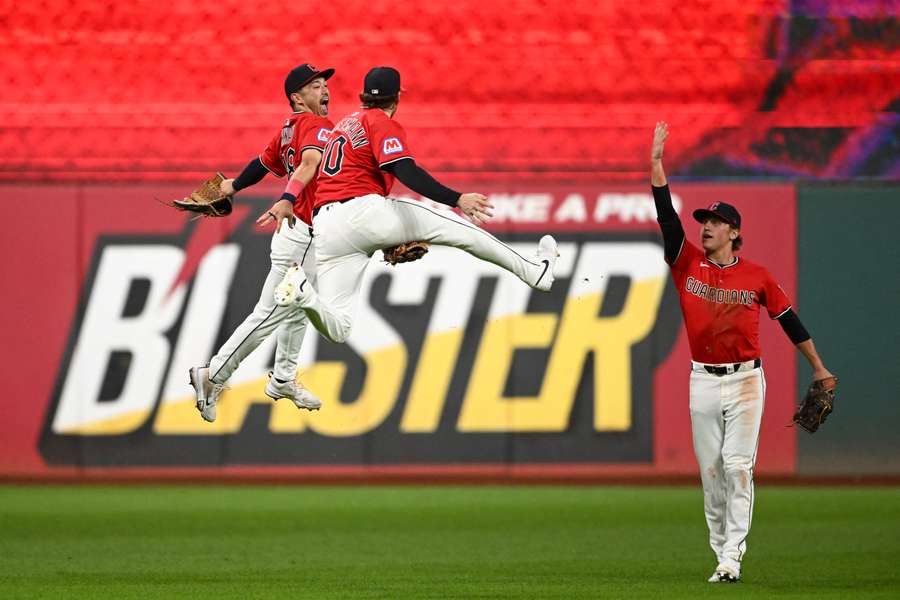 Cleveland Guardians players celebrate after win over the Detroit Tigers