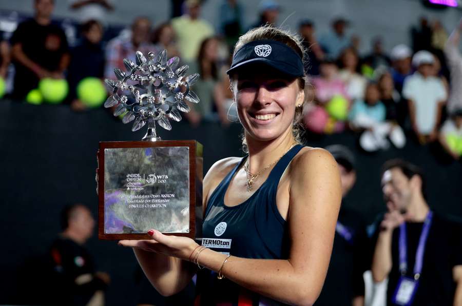 Frech celebrates her first WTA trophy win