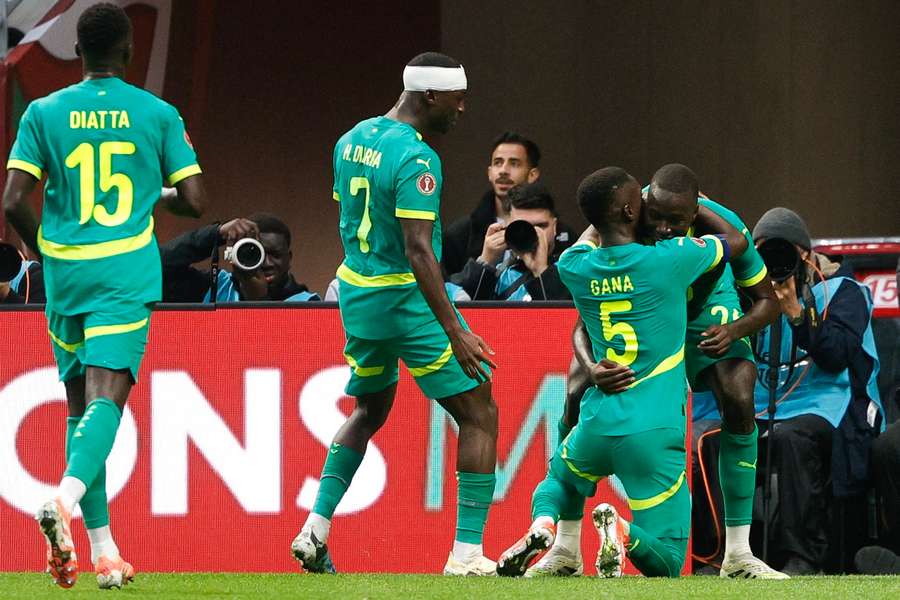 Senegal's Pape Gueye celebrates his goal with teammates