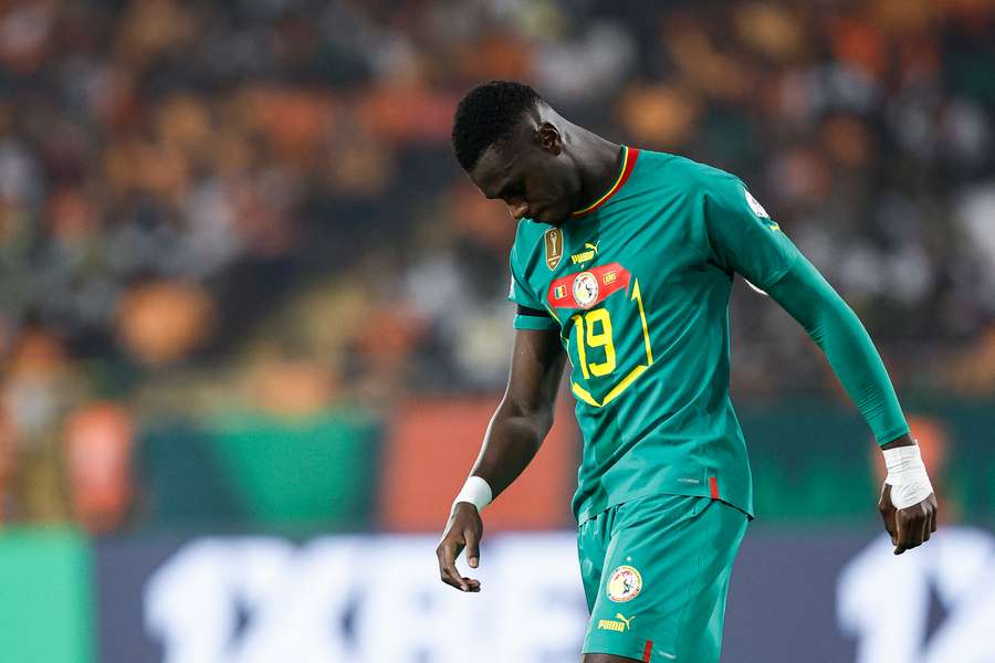 Senegal's Moussa Niakhate reacts after failing to score from the penalty spot
