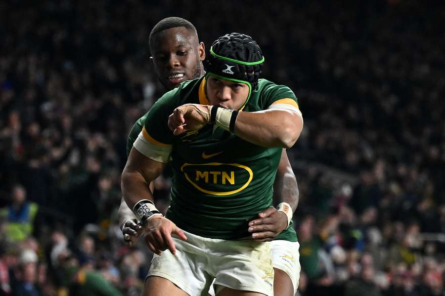 Cheslin Kolbe celebrates after scoring against England