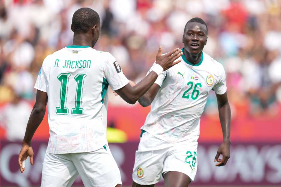 Nicolas Jackson et Pape Gueye célèbrent un but du Sénégal lors du match du Mondial 2026 face à l'Irak, au stade de Toronto, le 26 juin 2026.