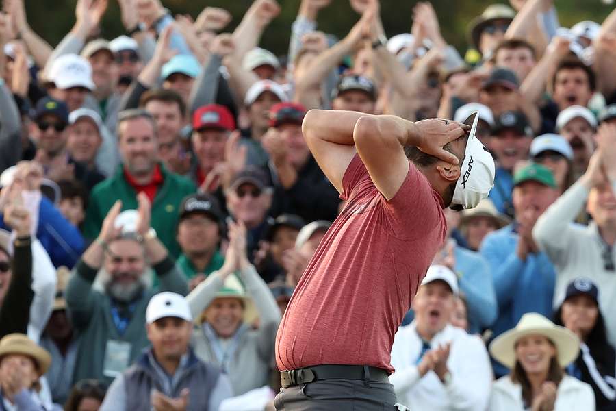 Jon Rahm of Spain celebrates on the 18th green after his victory