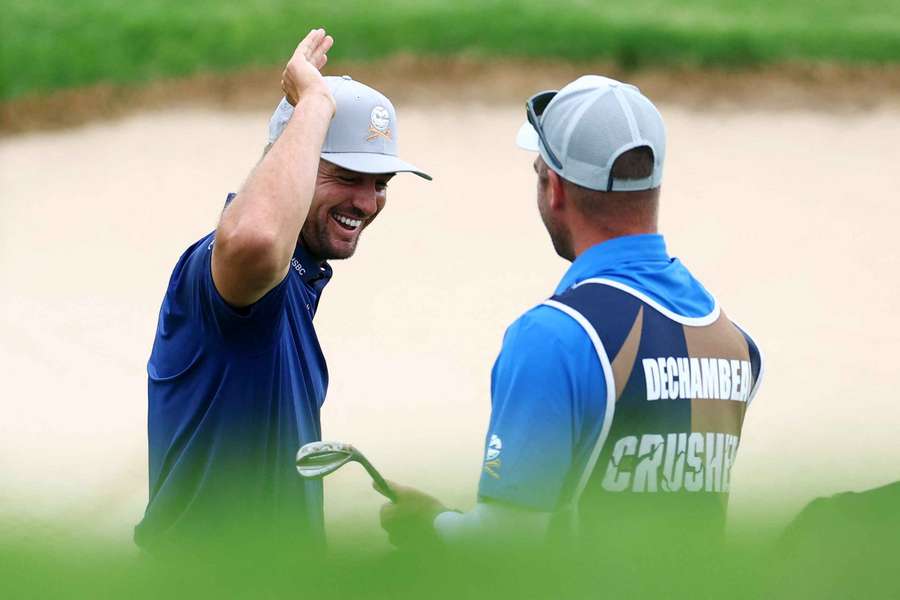Bryson DeChambeau celebrates picking up a shot in South Africa