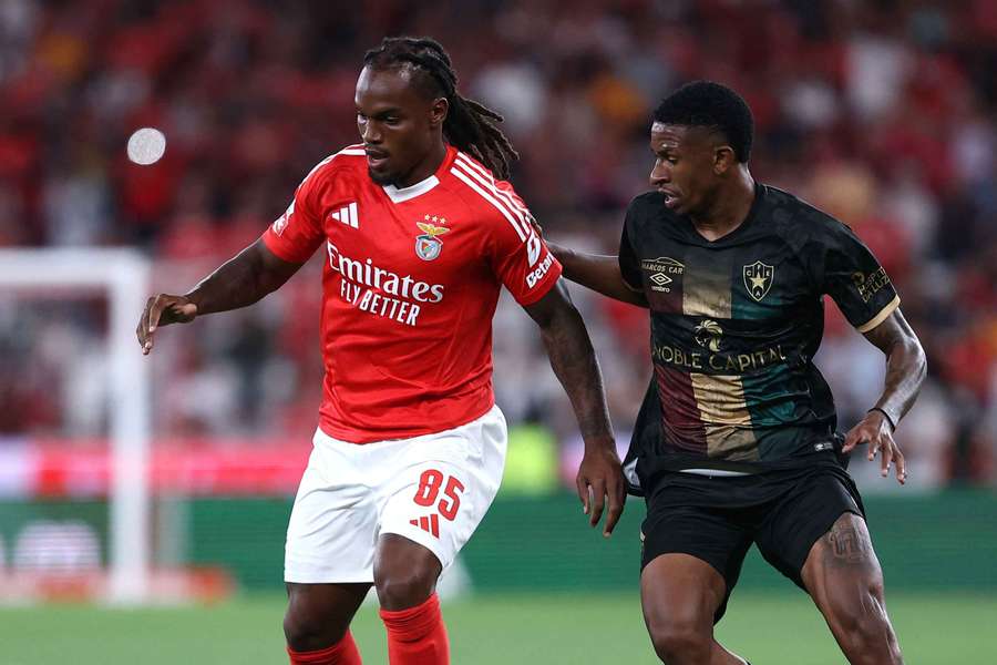 Renato Sanches in action with Estrela's Andre Luiz 