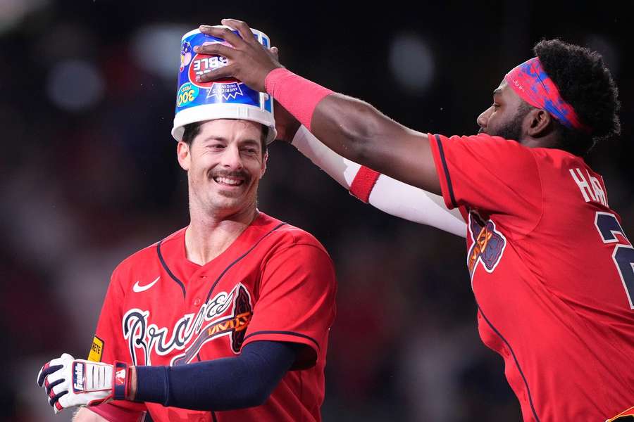 Atlanta Braves' Mike Yastrzemski (left) and Michael Harris II (right) celebrate walk-off win