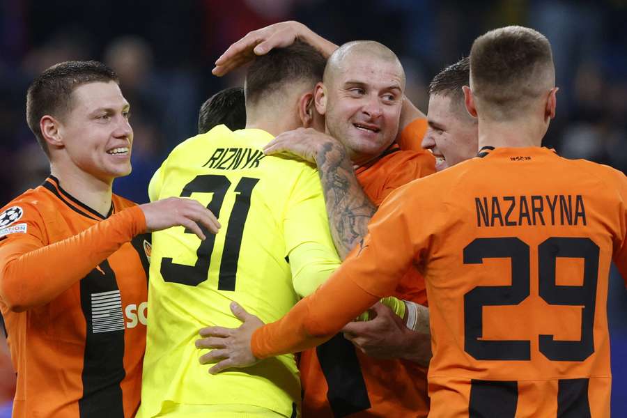 Shakhtar players celebrate after a famous win over Barcelona
