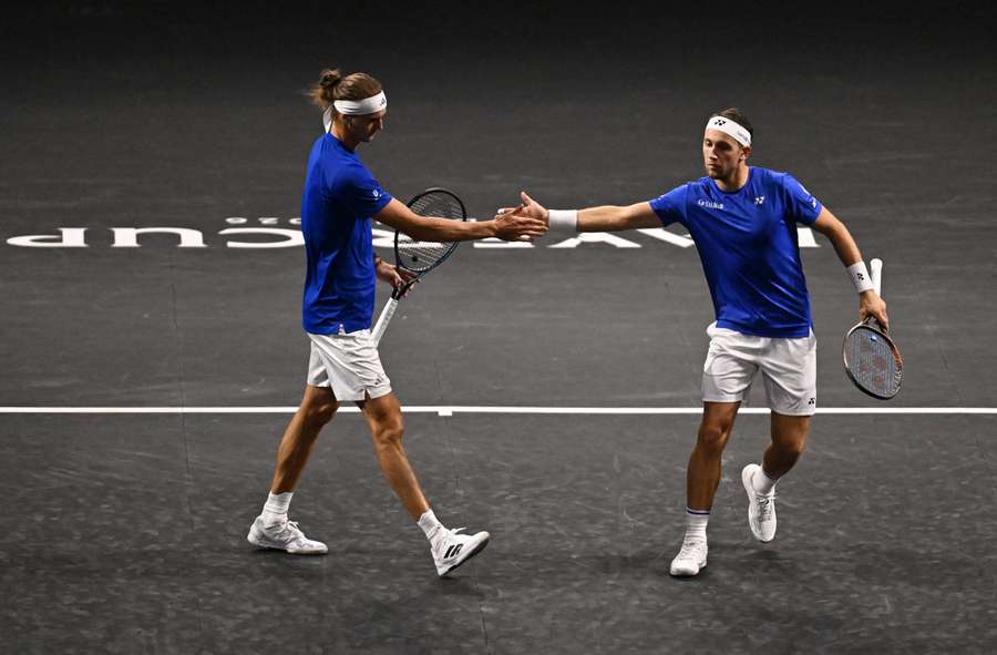 Alexander Zverev and Casper Ruud react during their doubles match against Alexander Bublik and Brandon Nakashima Alexander Zverev and Casper Ruud react during their doubles match against Alexander Bublik and Brandon Nakashima