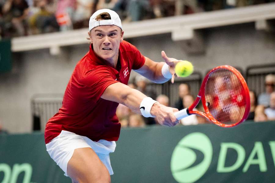 Holger Rune in action against Grigor Dimitrov