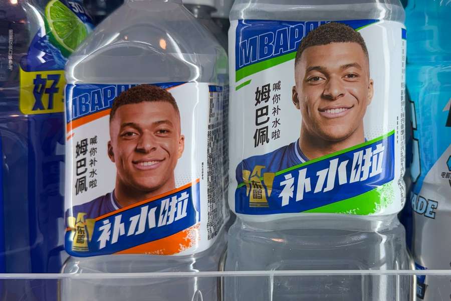 Bottles of Dongpeng electrolyte drink endorsed by Kylian Mbappe Bottles of Dongpeng electrolyte drink endorsed by Kylian Mbappe
