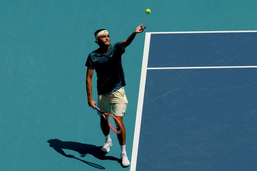 Taylor Fritz serves