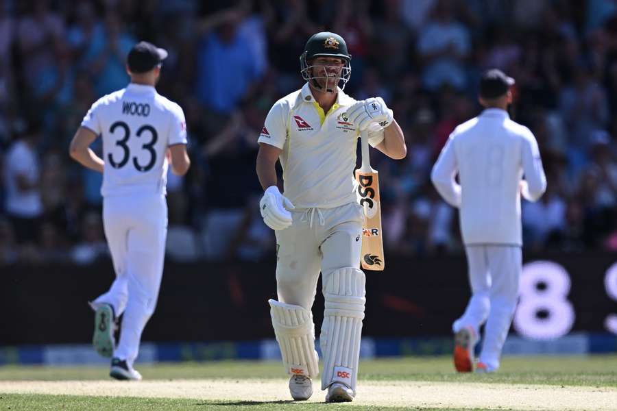 Australia's David Warner reacts as he walks back to the pavilion after losing his wicket for 1 run