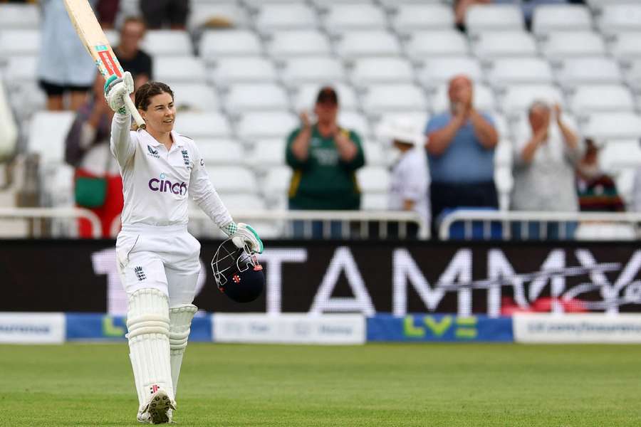 England's Tammy Beaumont celebrates reaching her century