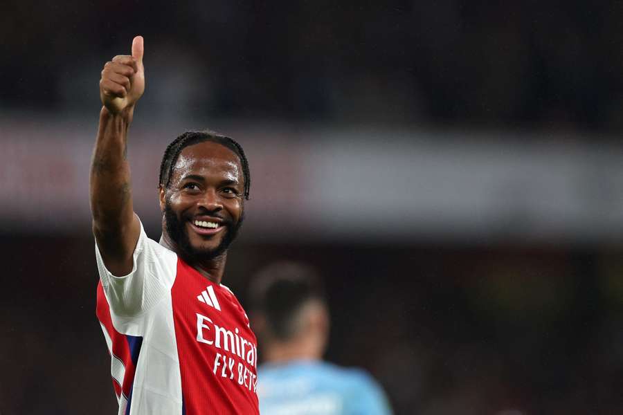 Sterling celebrates after scoring at the Emirates