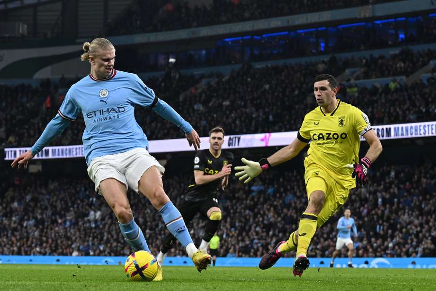 Erling Haaland controls the ball in the build-up to their second goal against Aston Villa