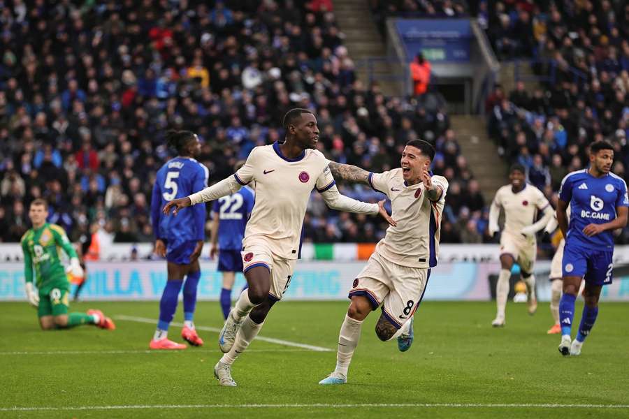 Jackson celebrates with teammates after scoring