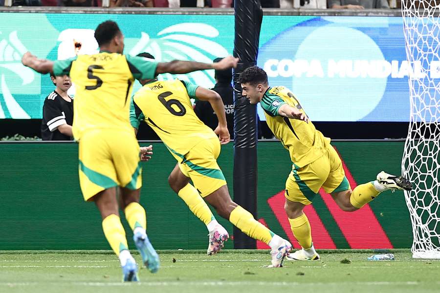 Jamaica celebrate their goal during their inter-confederation playoff win over New Caledonia.