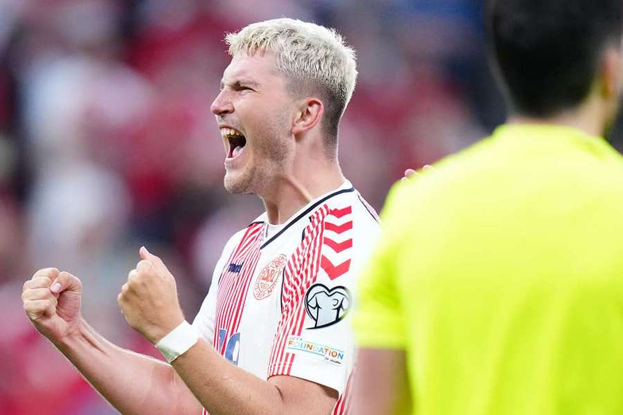 Denmark's Jonas Wind celebrates