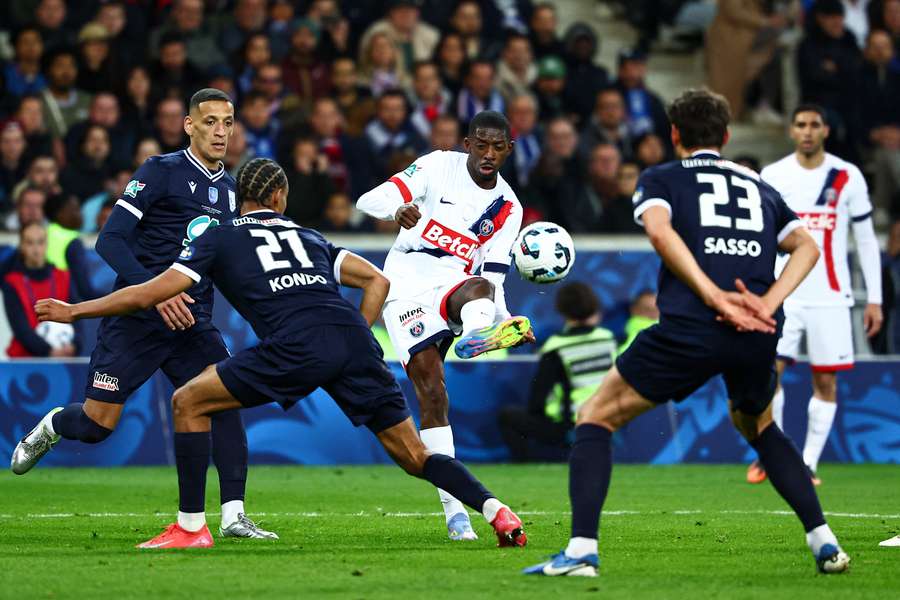 Ousmane Dembele takes a shot for PSG against Dunkerque