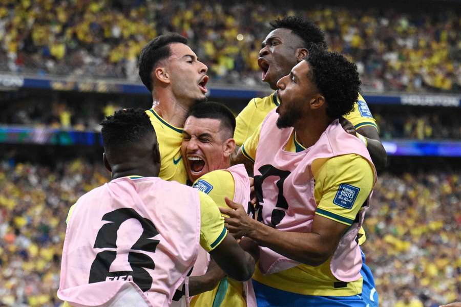 Gabriel Martinelli celebrates scoring Brazil's winning goal with teammates