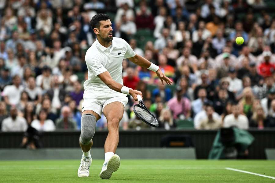 Novak Djokovic has received a walkover into the Wimbledon semi-finals