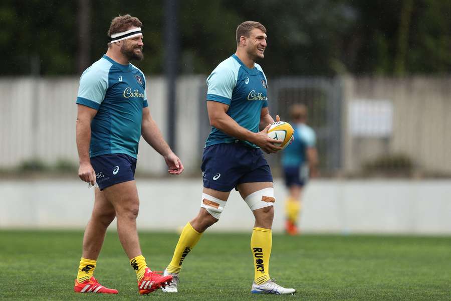 New Wallabies captain Nick Champion De Crespigny shares a laugh with James Slipper at Friday's captain's run.