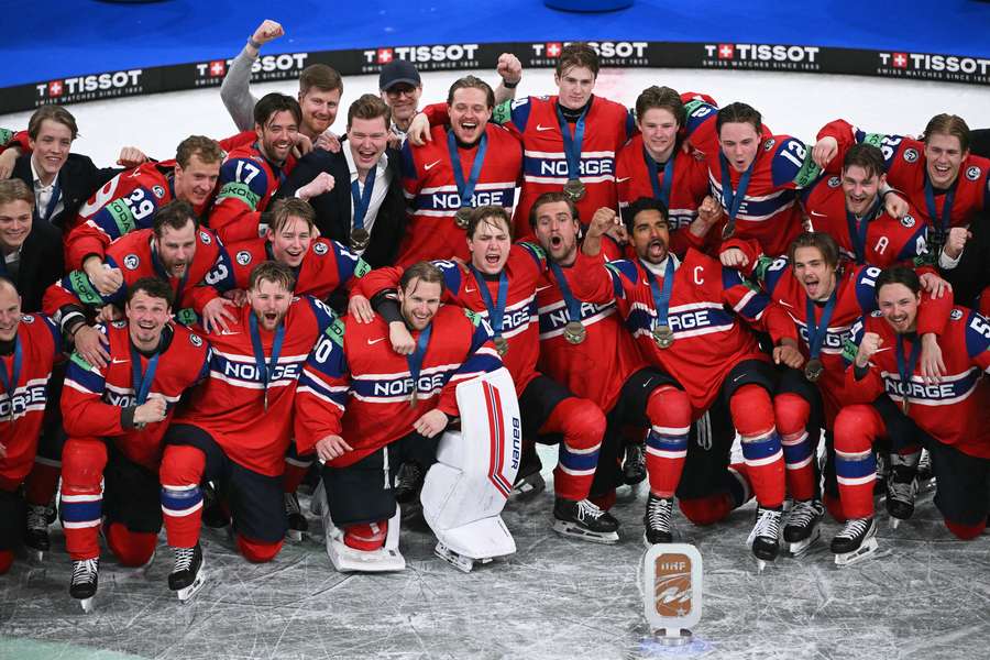 Norway's players celebrate after winning the IIHF Ice Hockey Men's World Championship bronze medal match Norway's players celebrate after winning the IIHF Ice Hockey Men's World Championship bronze medal match