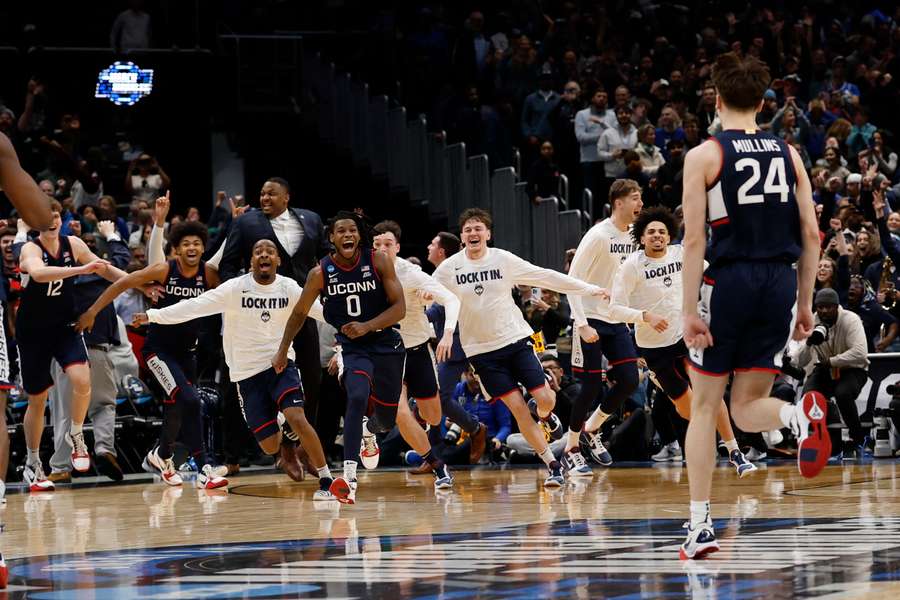UConn celebrate a historic comeback win against Duke to advance to the Final Four 