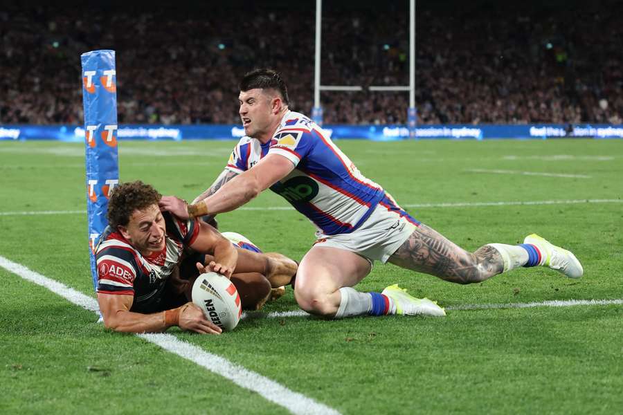 Mark Nawaqanitawase scoring an NRL Grand Final try against Newcastle. Mark Nawaqanitawase scoring an NRL Grand Final try against Newcastle.