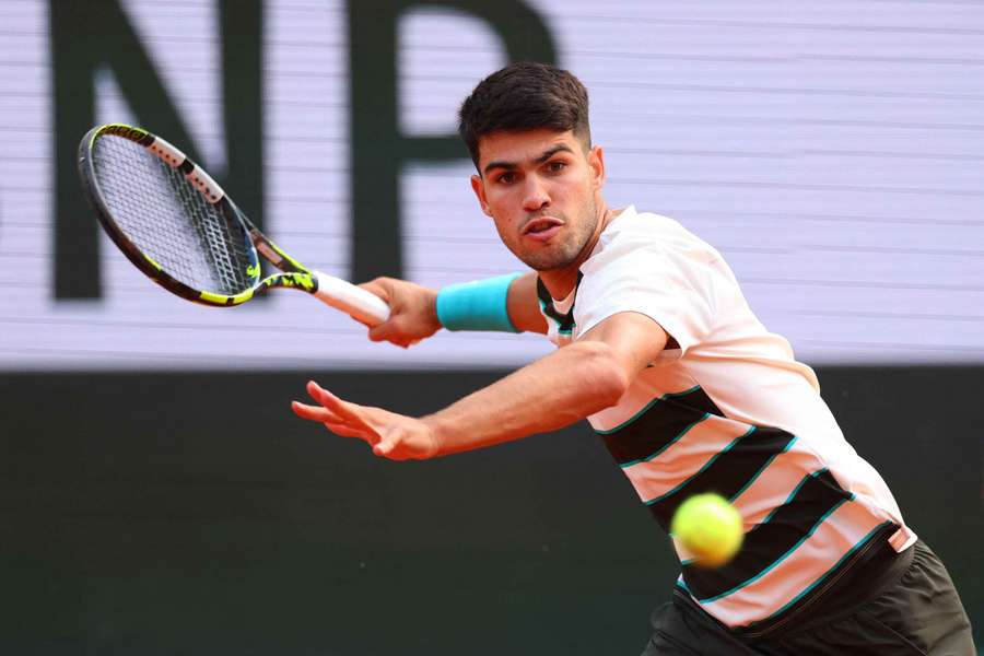 Carlos Alcaraz in action during his fourth-round match against Ben Shelton