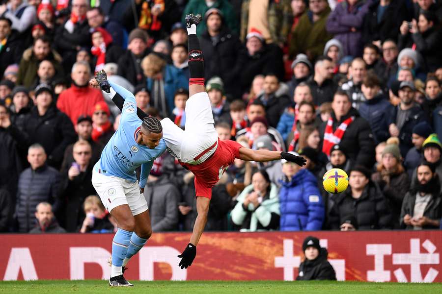 Anthony Martial clashes with Manchester City's Swiss defender Manuel Akanji 